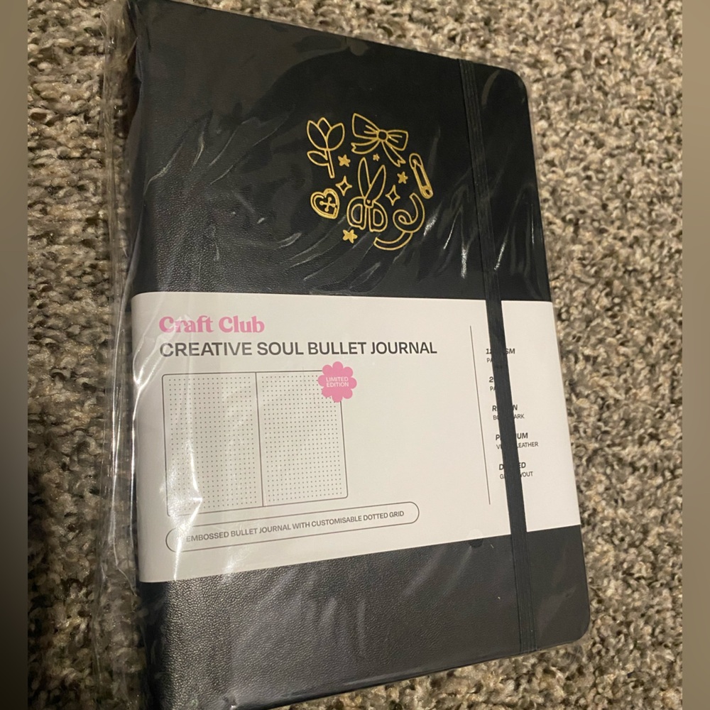 Black Bullet Journal with Gold Design